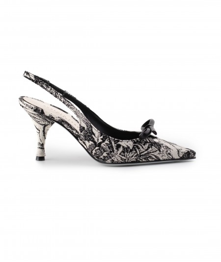 Chanel in tessuto fantasia nero con fiocco in pelle